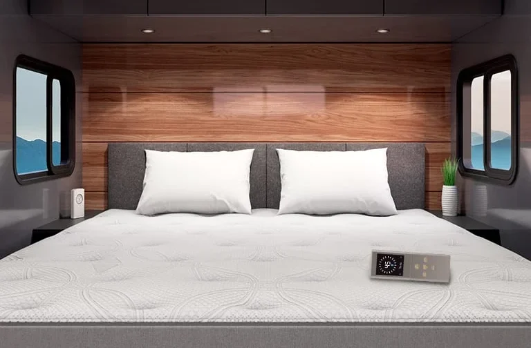 Queen bed with mattress in RV bedroom