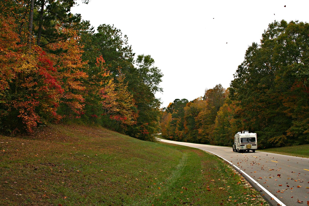 RV on the road during the Fall